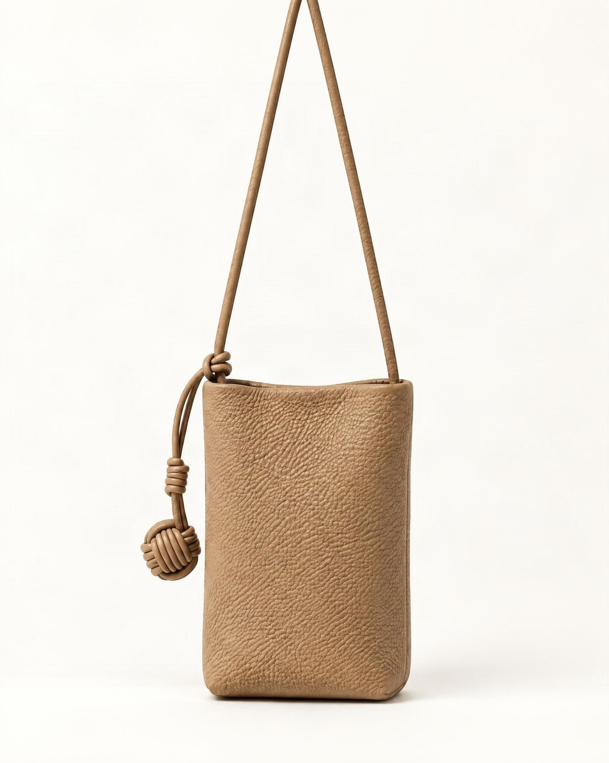 Cowhide Leather Micro Bucket Phone Crossbody Bag — straight-on front view on a warm white background