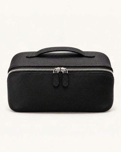 Top-Grain Cowhide Cosmetic Pouch — straight-on front view on a warm white background