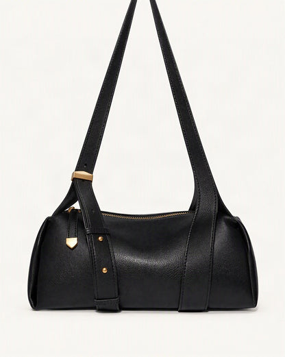 Cowhide Soft Pillow Crossbody Bag with Adjustable Wide Strap — straight-on front view on a warm white background