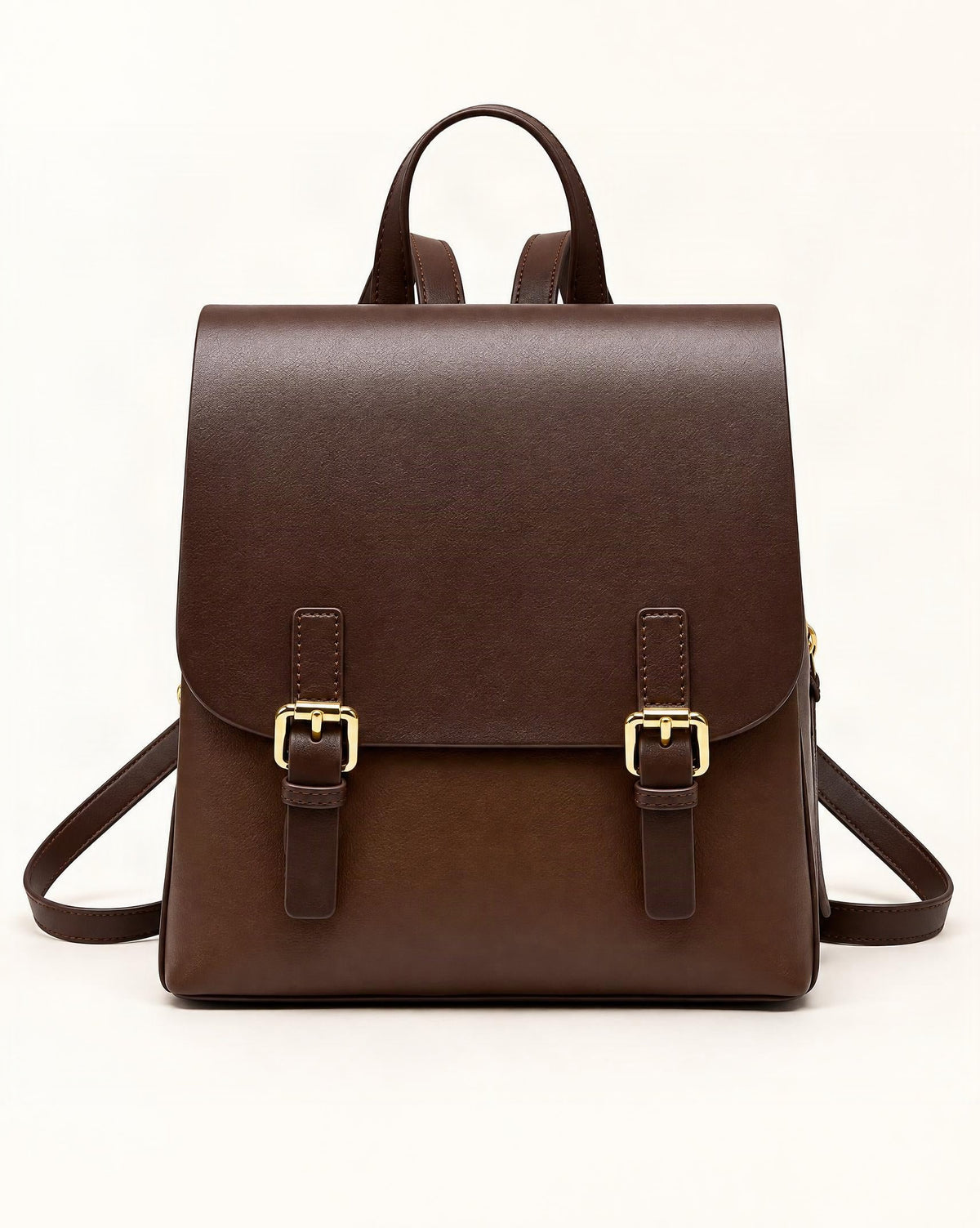 Cowhide Leather Backpack with Magnetic Flap — straight-on front view on a warm white background