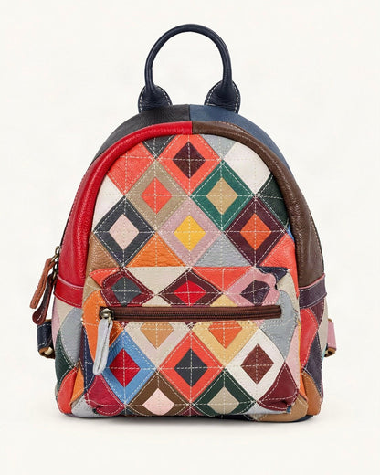 Top-Grain Cowhide Patchwork Backpack — straight-on front view on a warm white background