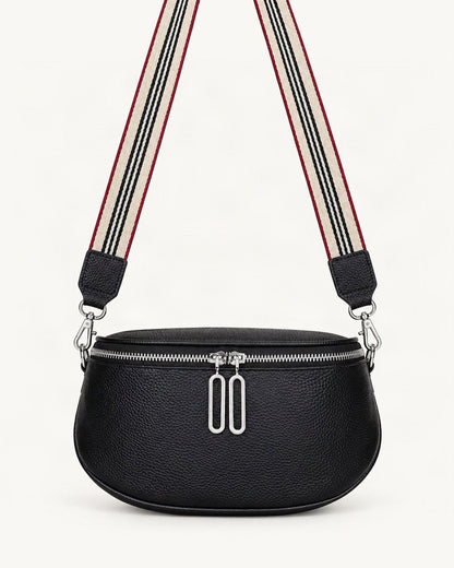Cowhide Mini Crossbody Bag — straight-on front view on a warm white background