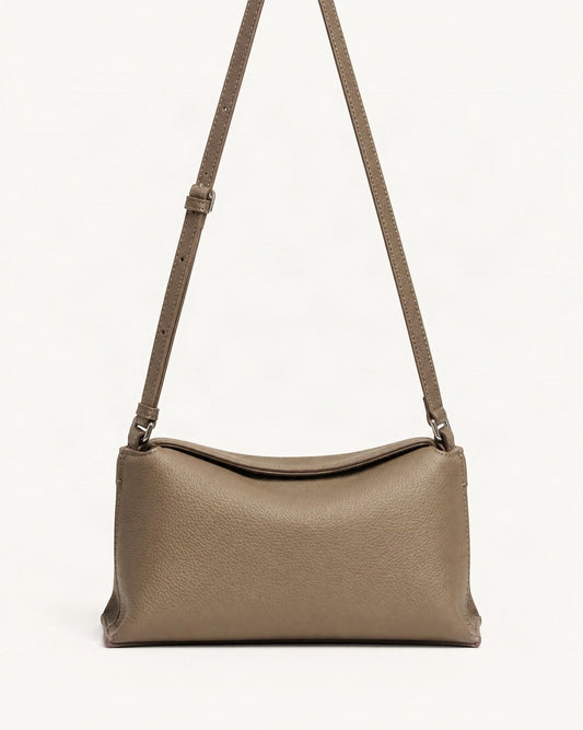 Cowhide Leather Mini Crossbody Bag – Color Options — straight-on front view on a warm white background
