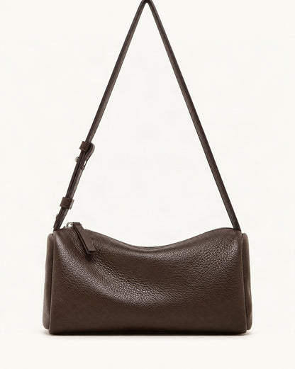 Cowhide Leather Small Barrel Crossbody Bag — straight-on front view on a warm white background