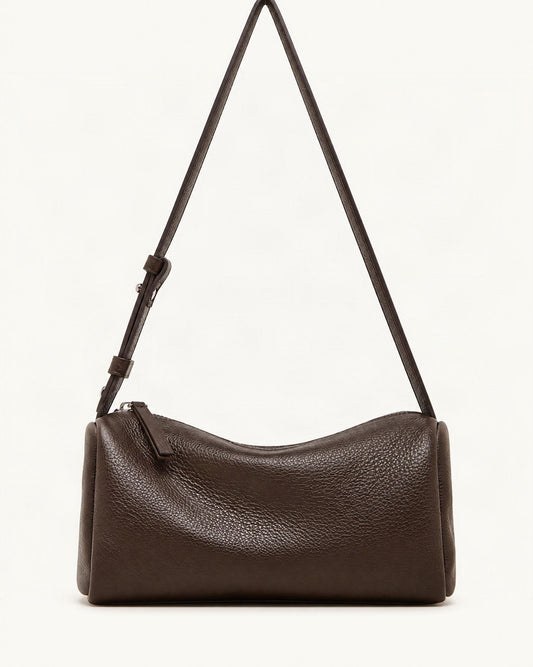 Cowhide Leather Small Barrel Crossbody Bag — straight-on front view on a warm white background