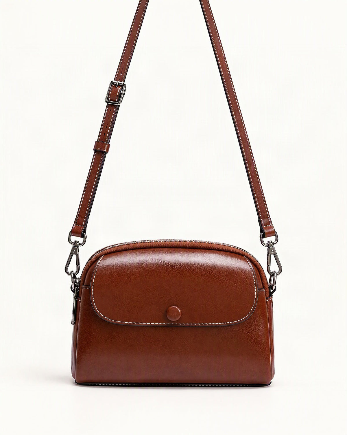 Cowhide Mini Crossbody Bag with Snap Flap, Oil-Waxed Leather — straight-on front view on a warm white background