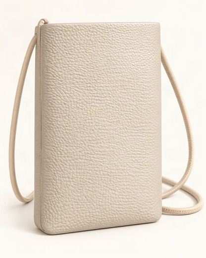 Cowhide Leather Micro Crossbody Phone Bag – Color Options — front three-quarter view on a warm white background