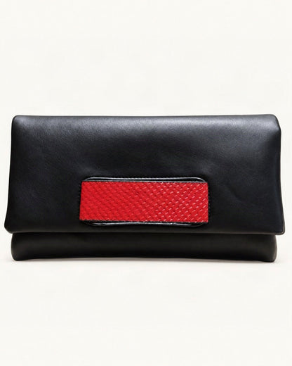 Cowhide Envelope Clutch Bag — straight-on front view on a warm white background