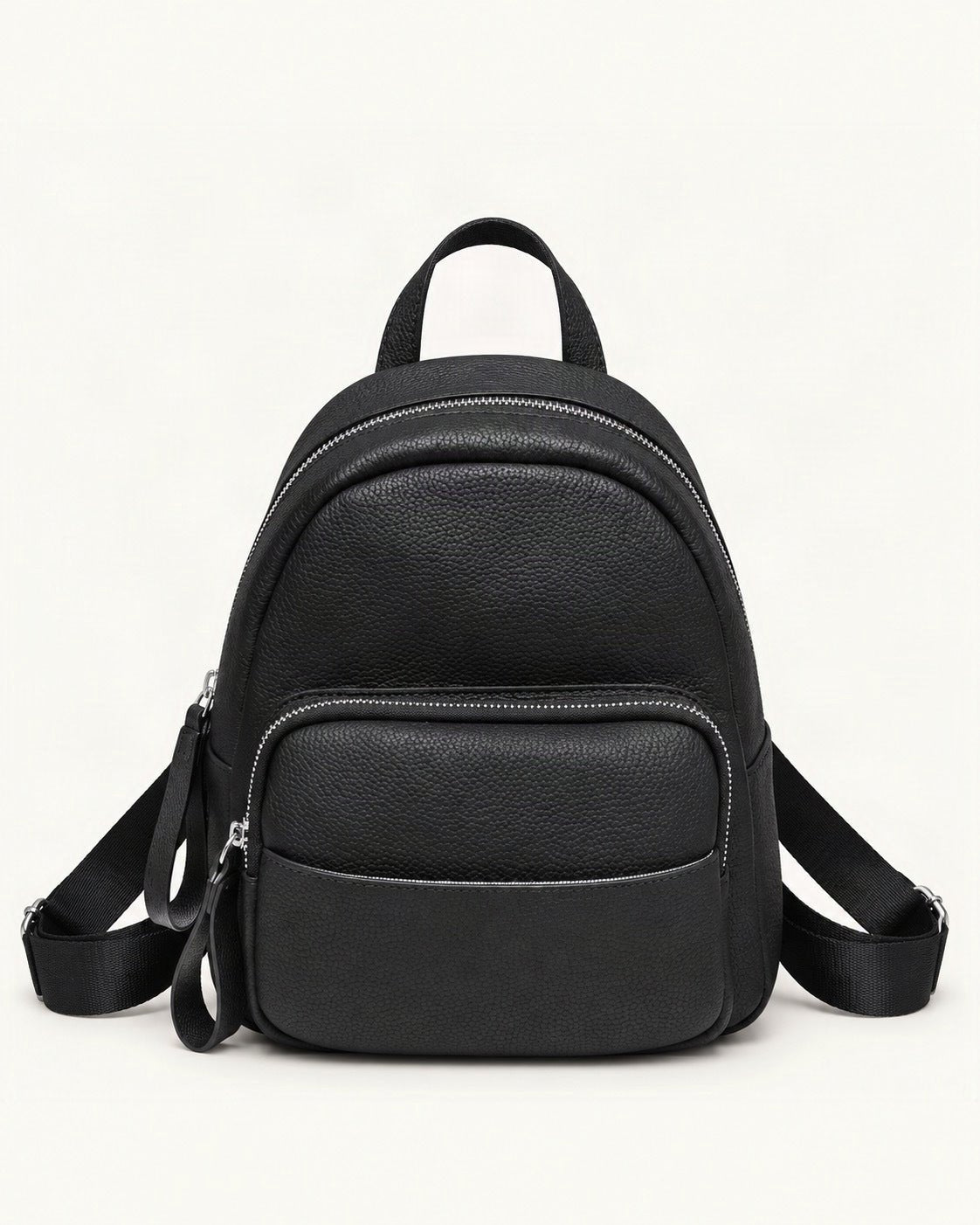 Leather Mini Backpack — straight-on front view on a warm white background