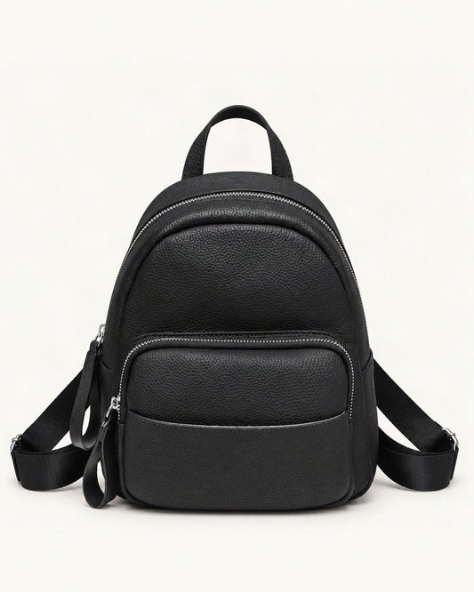 Leather Mini Backpack — straight-on front view on a warm white background