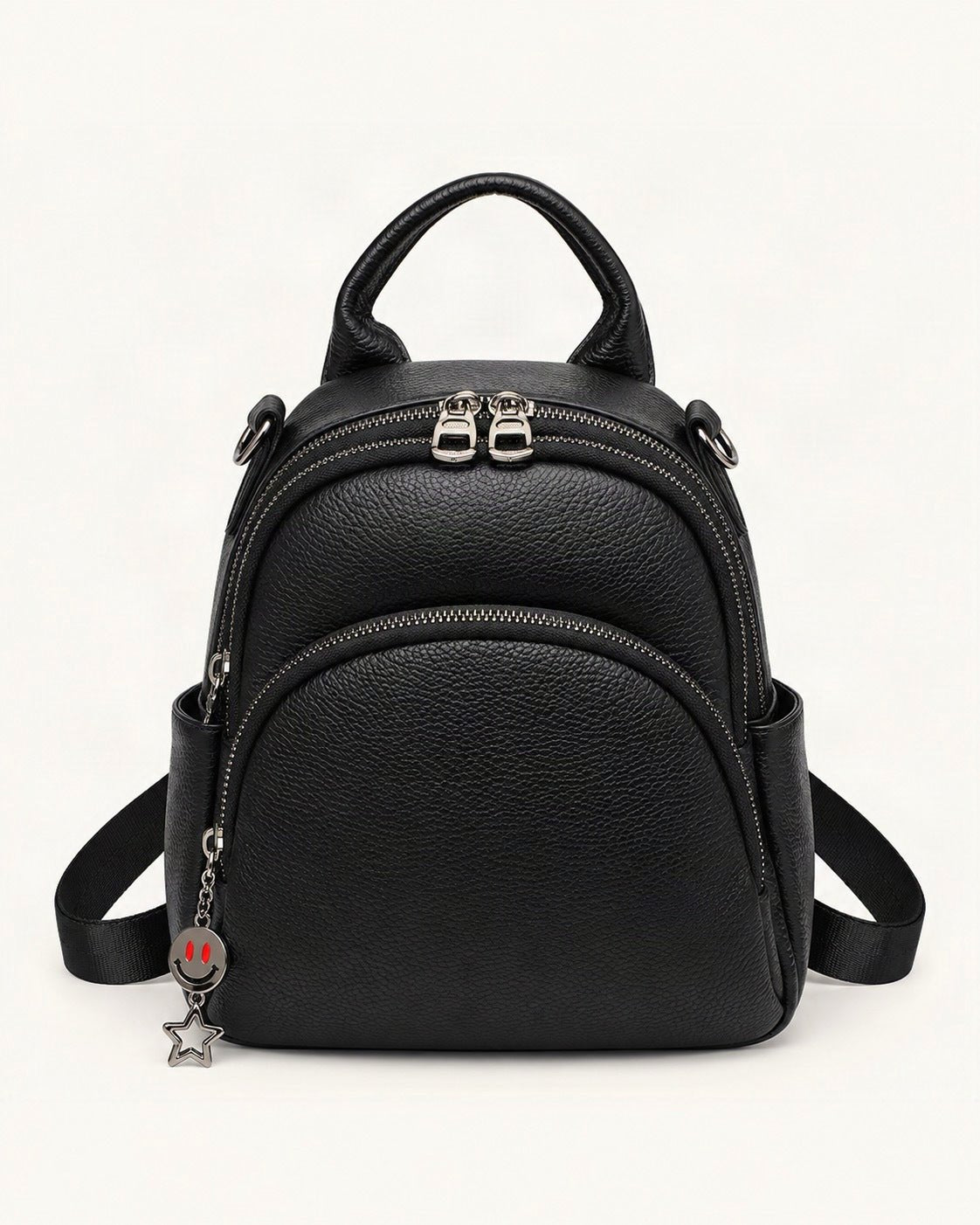 Top-Grain Cowhide Convertible Backpack — straight-on front view on a warm white background
