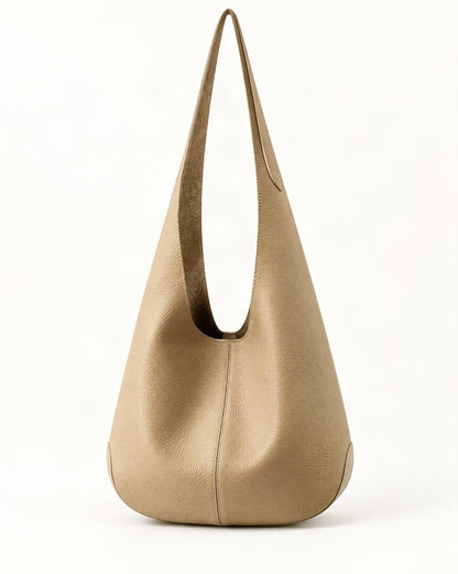 Cowhide Leather Small Bucket Tote Shoulder Bag — straight-on front view on a warm white background