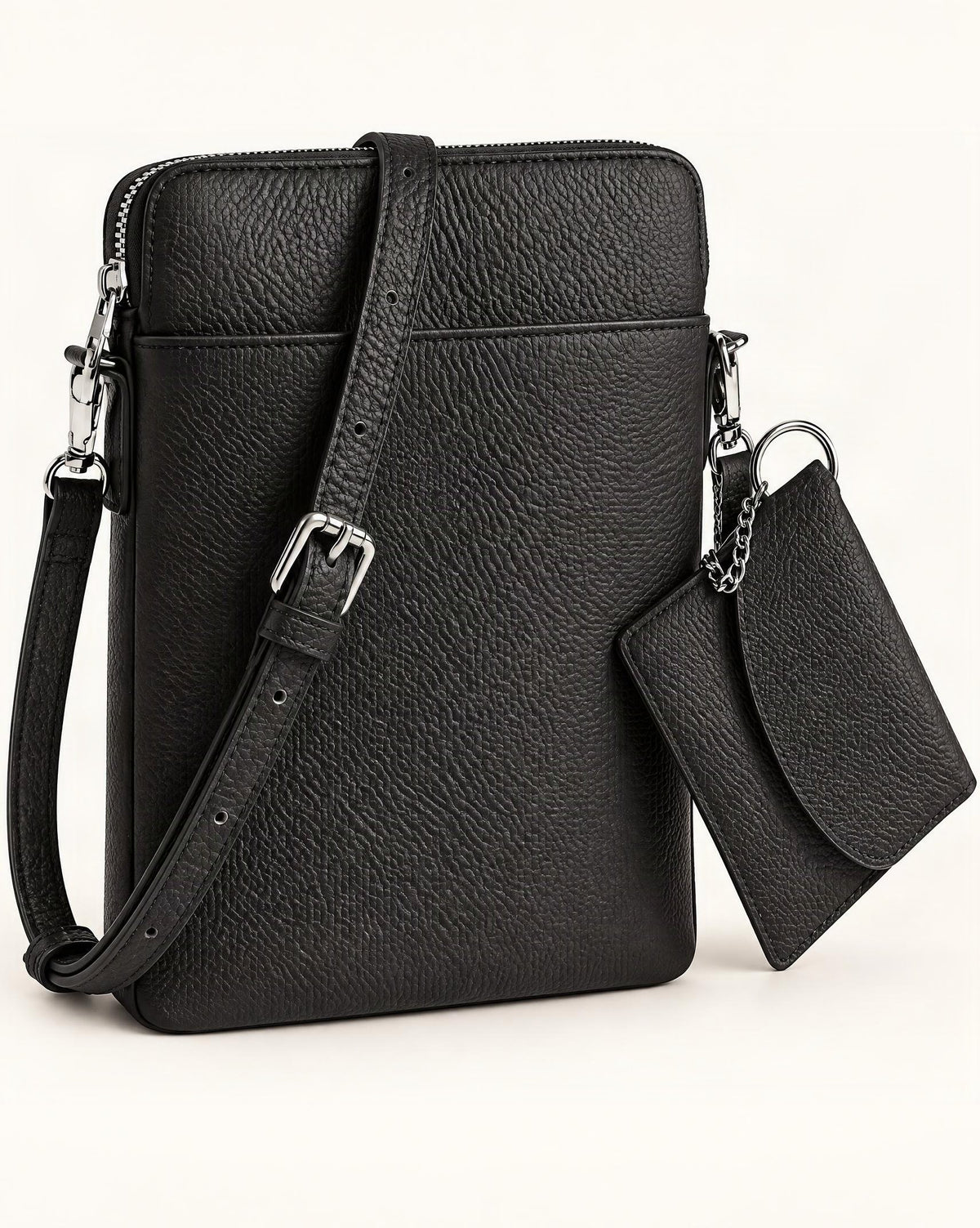 Top-Grain Cowhide Leather Mini Crossbody Phone Bag — front three-quarter view on a warm white background