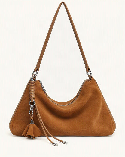 Nubuck Cowhide Underarm Tote Bag with Tassel — straight-on front view on a warm white background