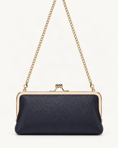 Top-Grain Cowhide Frame Crossbody Bag — straight-on front view on a warm white background