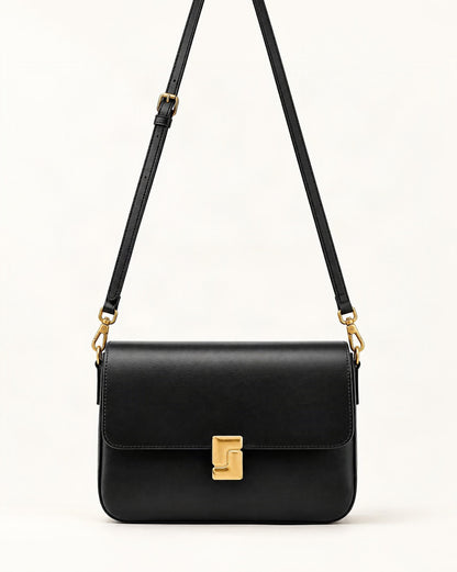 Cowhide Leather Small Crossbody Bag with Turn-Lock Closure — straight-on front view on a warm white background