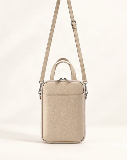 Cowhide Leather Vertical Phone Crossbody Bag – Color Options — straight-on front view on a warm white background