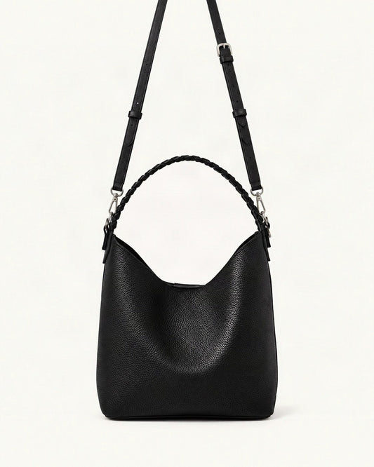 Cowhide Leather Bucket Bag Braided Handle — straight-on front view on a warm white background