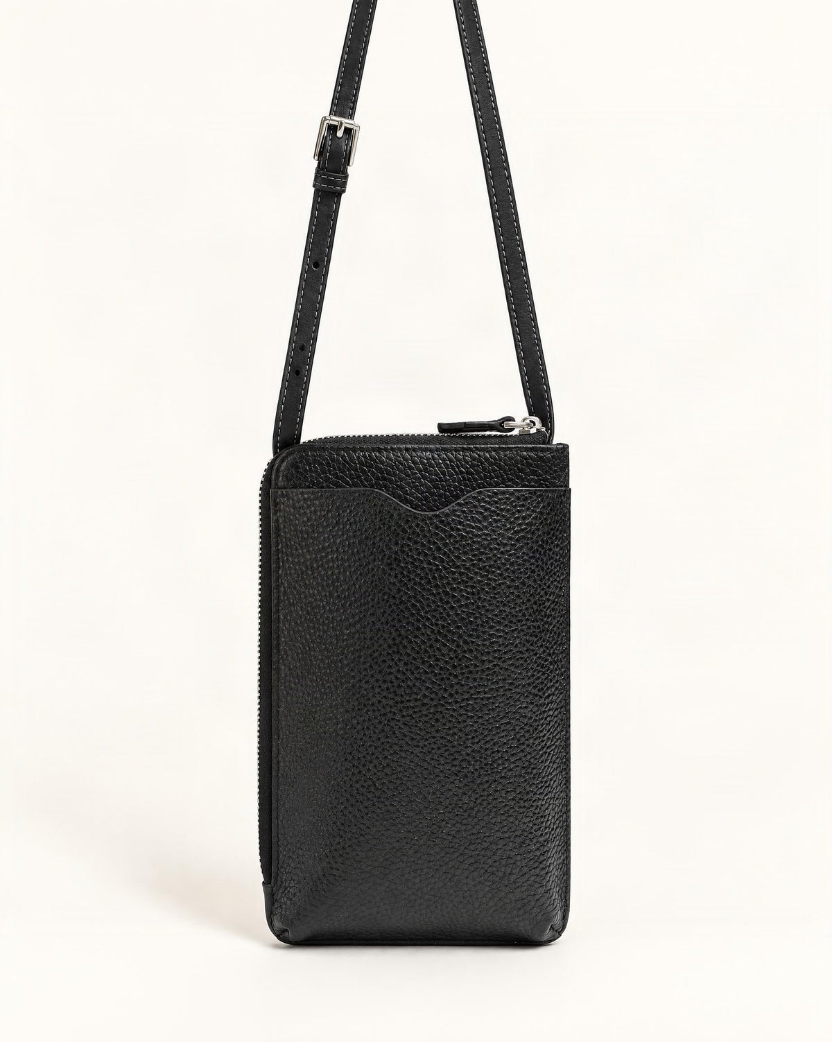 Cowhide Leather Vertical Phone Crossbody Bag — straight-on front view on a warm white background