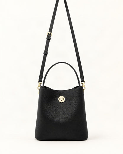 Top-Grain Cowhide Small Bucket Bag — straight-on front view on a warm white background