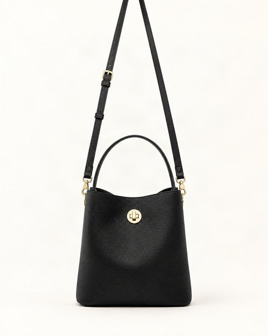 Top-Grain Cowhide Small Bucket Bag — straight-on front view on a warm white background