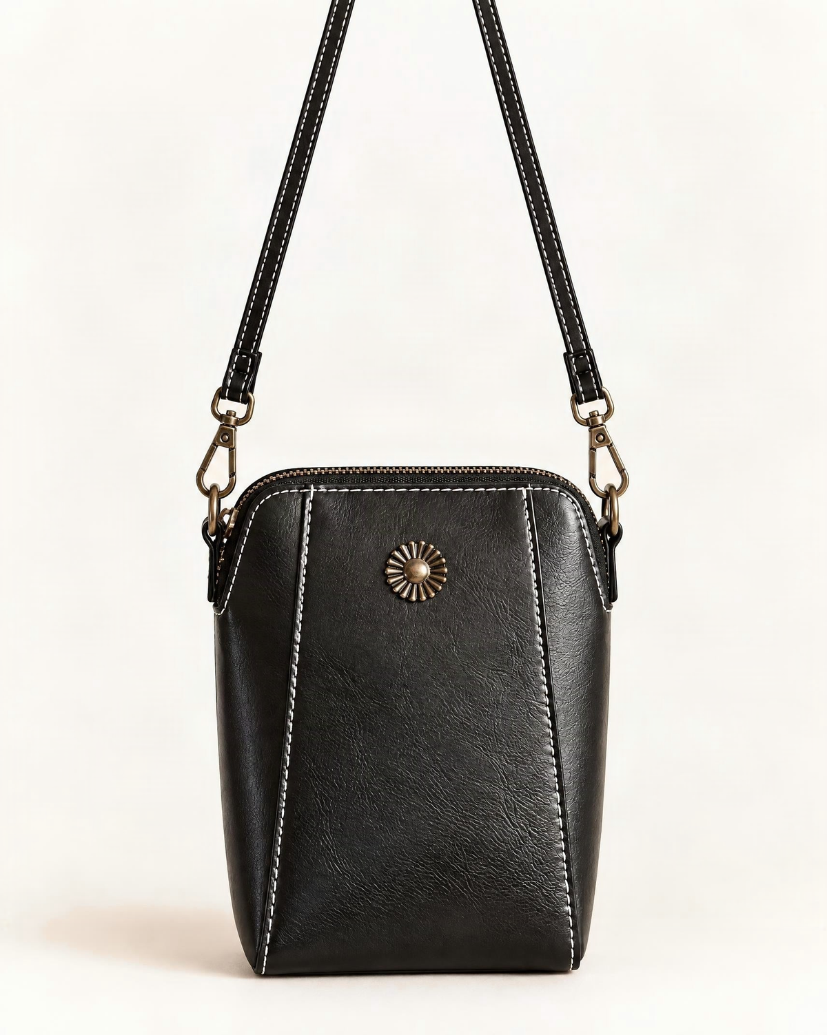 Cowhide Leather Micro Crossbody Phone Bag with Zip Closure — straight-on front view on a warm white background