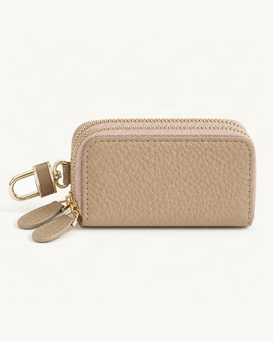 Cowhide Leather Compact Key Case with Clip — straight-on front view on a warm white background