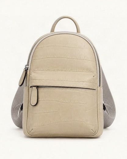 Top-Grain Cowhide Small Backpack — straight-on front view on a warm white background