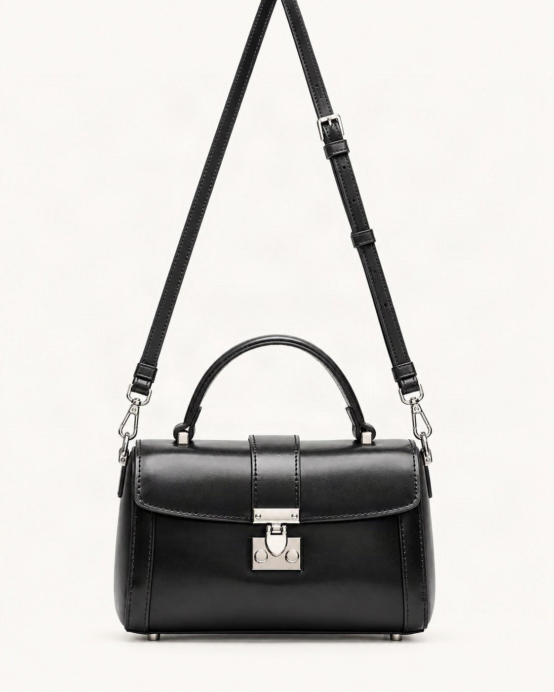 Cowhide Leather Mini Box Crossbody Bag with Lock Clasp — straight-on front view on a warm white background