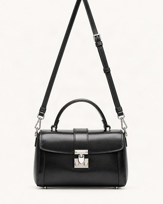 Cowhide Leather Mini Box Crossbody Bag with Lock Clasp — straight-on front view on a warm white background