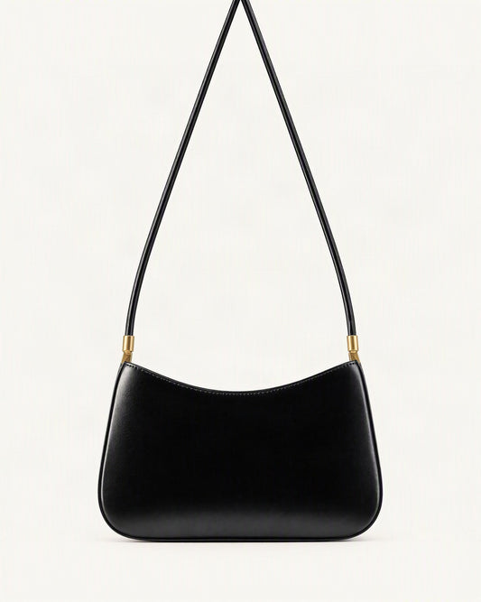 Cowhide Leather Shoulder Bag — straight-on front view on a warm white background