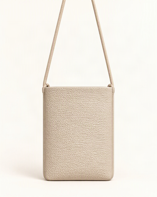 Cowhide Leather Micro Crossbody Phone Bag – Color Options — straight-on front view on a warm white background