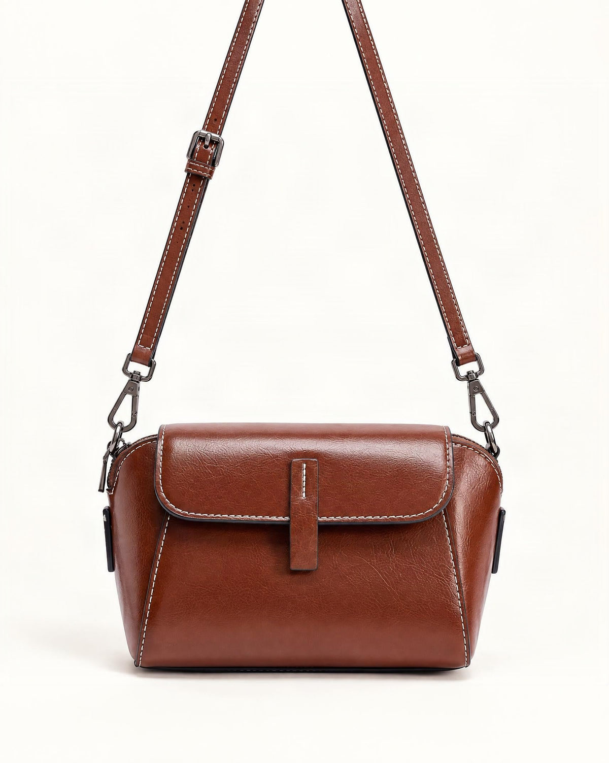 Cowhide Oil-Wax Leather Small Crossbody Bag — straight-on front view on a warm white background