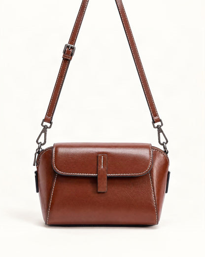 Cowhide Oil-Wax Leather Small Crossbody Bag — straight-on front view on a warm white background