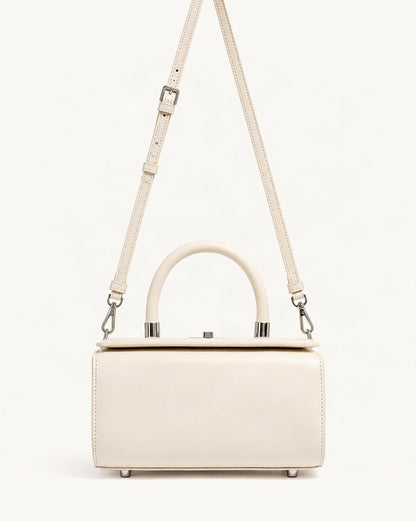 Cowhide Leather Box Handbag — straight-on front view on a warm white background