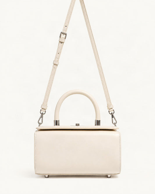 Cowhide Leather Box Handbag — straight-on front view on a warm white background