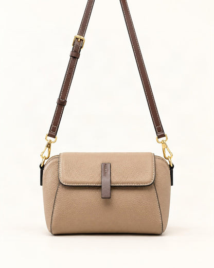 Cowhide Small Shell Crossbody Bag — straight-on front view on a warm white background