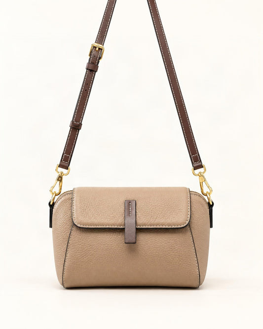 Cowhide Small Shell Crossbody Bag — straight-on front view on a warm white background