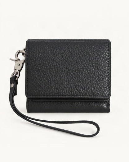 Cowhide Leather Tri-Fold RFID-Blocking Wallet — straight-on front view on a warm white background