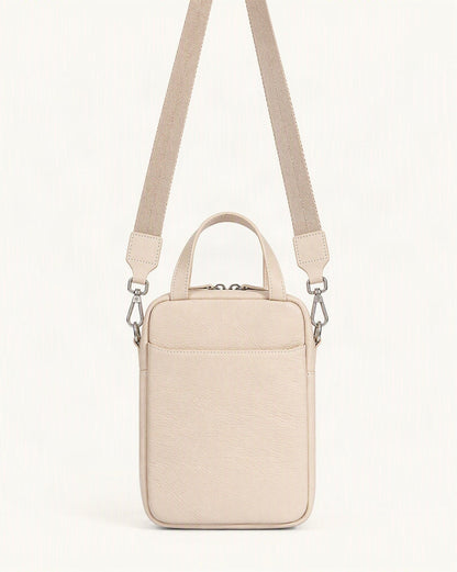 Pebbled Cowhide Leather Mini Crossbody Phone Bag — straight-on front view on a warm white background