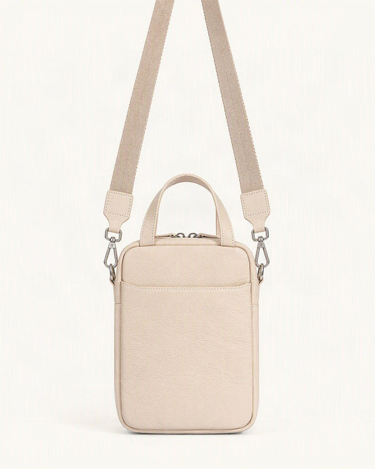 Pebbled Cowhide Leather Mini Crossbody Phone Bag — straight-on front view on a warm white background