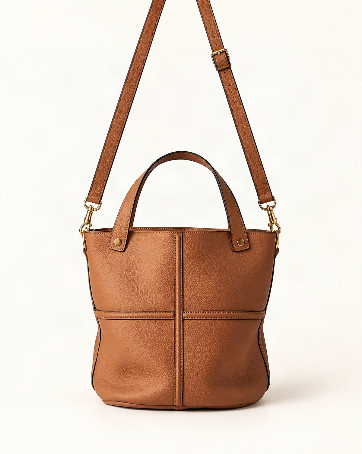 Top-Grain Cowhide Bucket Bag with Detachable Crossbody Strap — straight-on front view on a warm white background