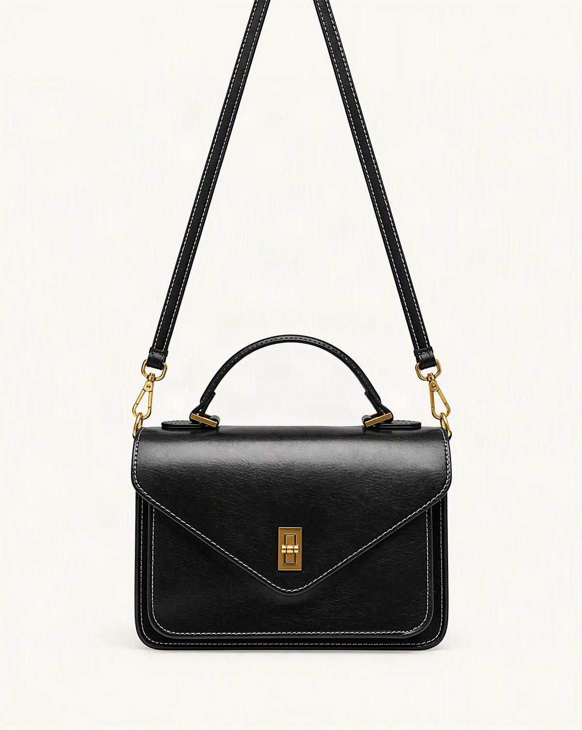 Cowhide Leather Small Messenger Crossbody Bag — straight-on front view on a warm white background