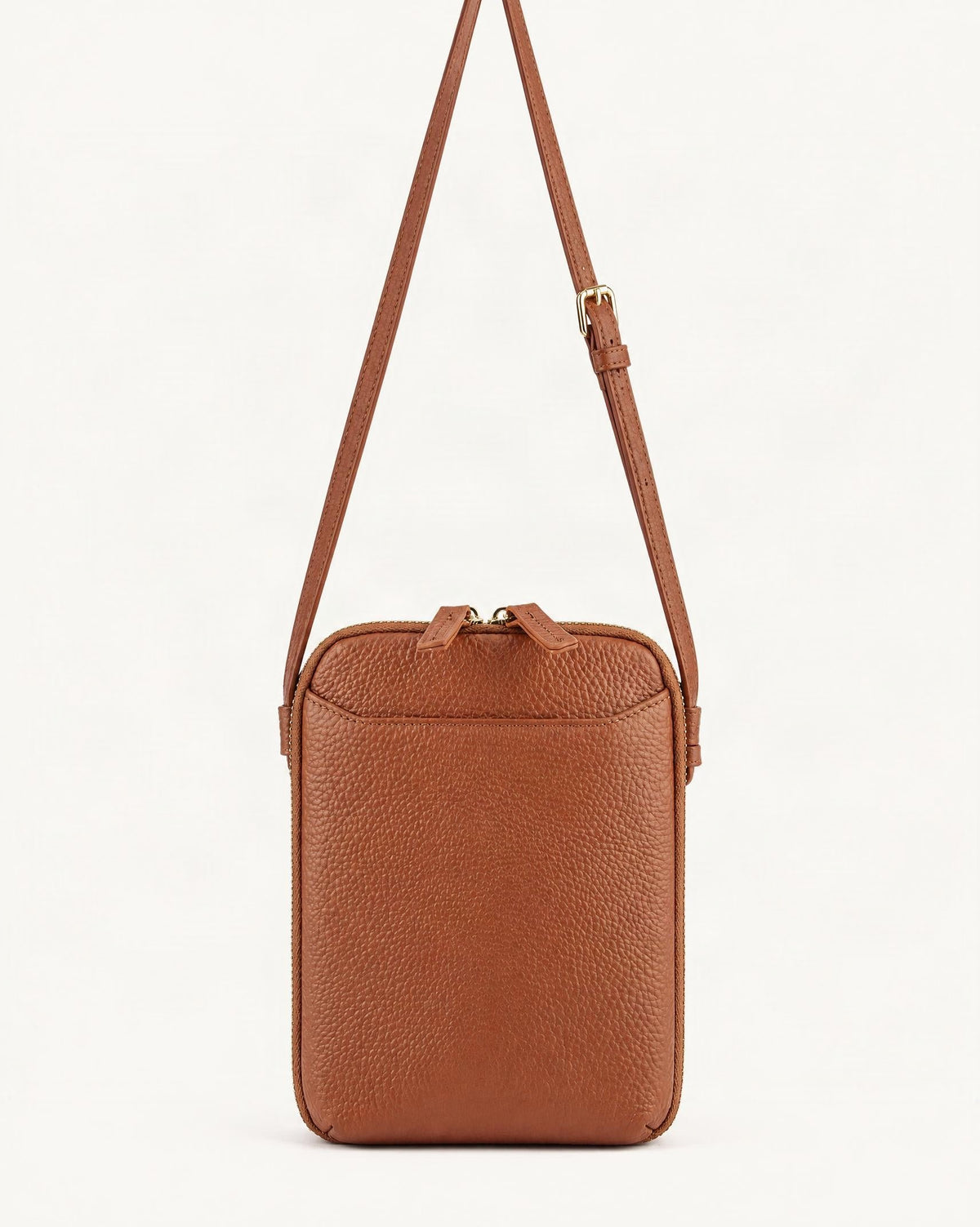 Cowhide Vertical Crossbody Phone Bag, Pebbled — straight-on front view on a warm white background