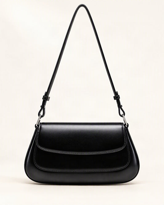 Slim Cowhide Leather Baguette Shoulder Bag — straight-on front view on a warm white background