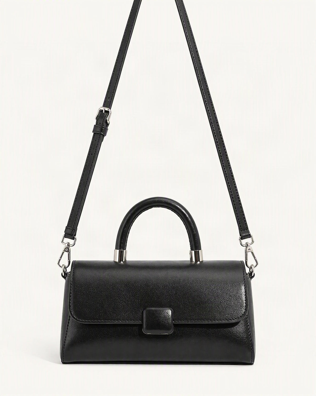 Cowhide Leather Small Top-Handle Crossbody Bag — straight-on front view on a warm white background