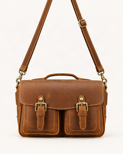 Top-Grain Cowhide Camera Crossbody Bag — straight-on front view on a warm white background