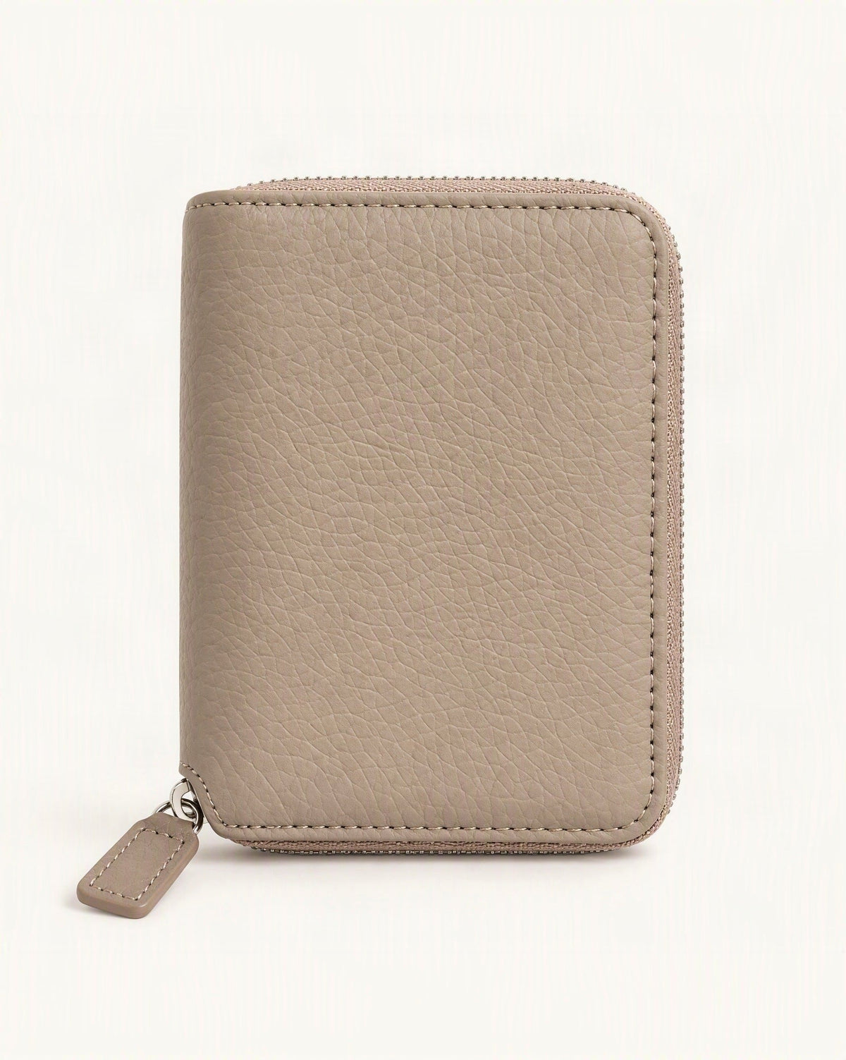 Cowhide Leather Compact Bi-Fold Wallet — straight-on front view on a warm white background