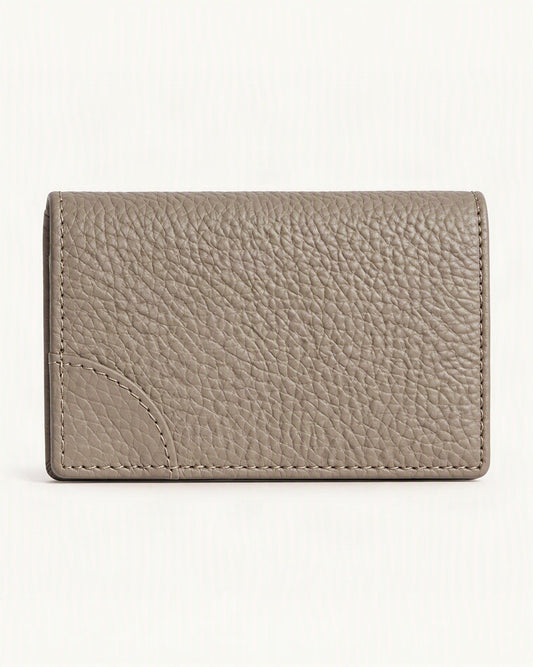 Cowhide Leather Mini Bifold Card Holder Wallet — straight-on front view on a warm white background
