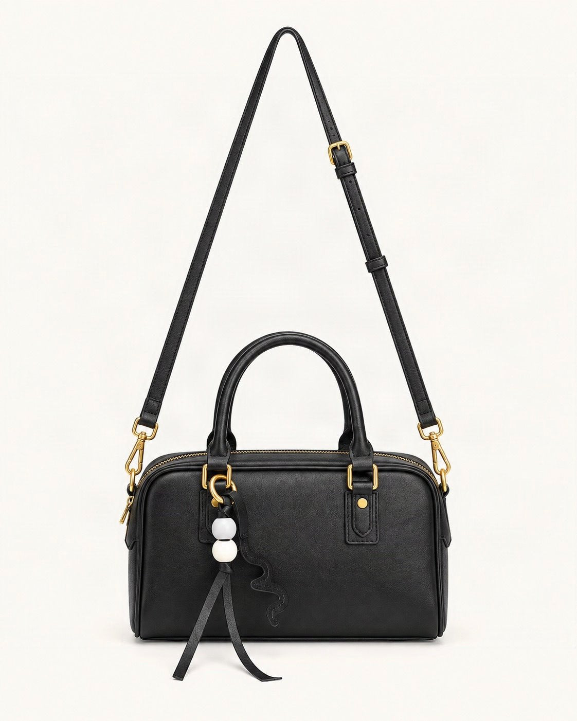 Cowhide Leather Double-Handle Pillow Crossbody Bag — straight-on front view on a warm white background